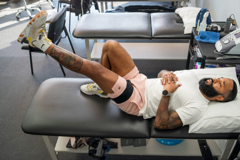 image of a man doing physical therapy in the woodbridge nj office